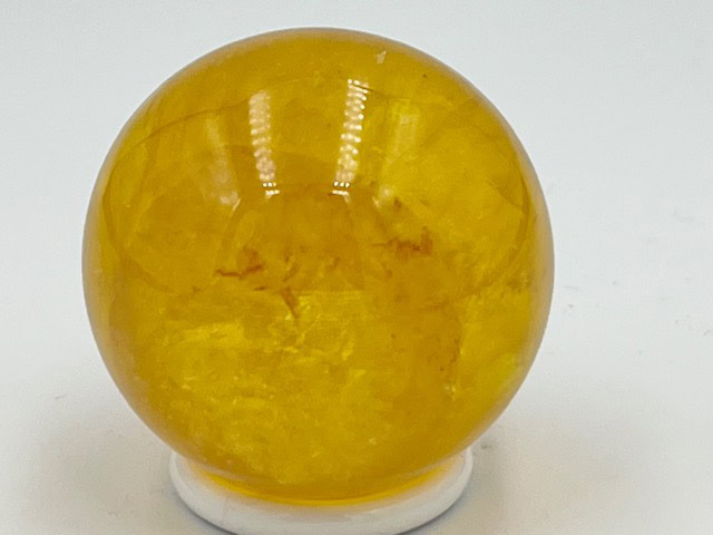 Fluoriet goudgeel met Mica Bol 13: 3.5 cm Ø - 88 gram